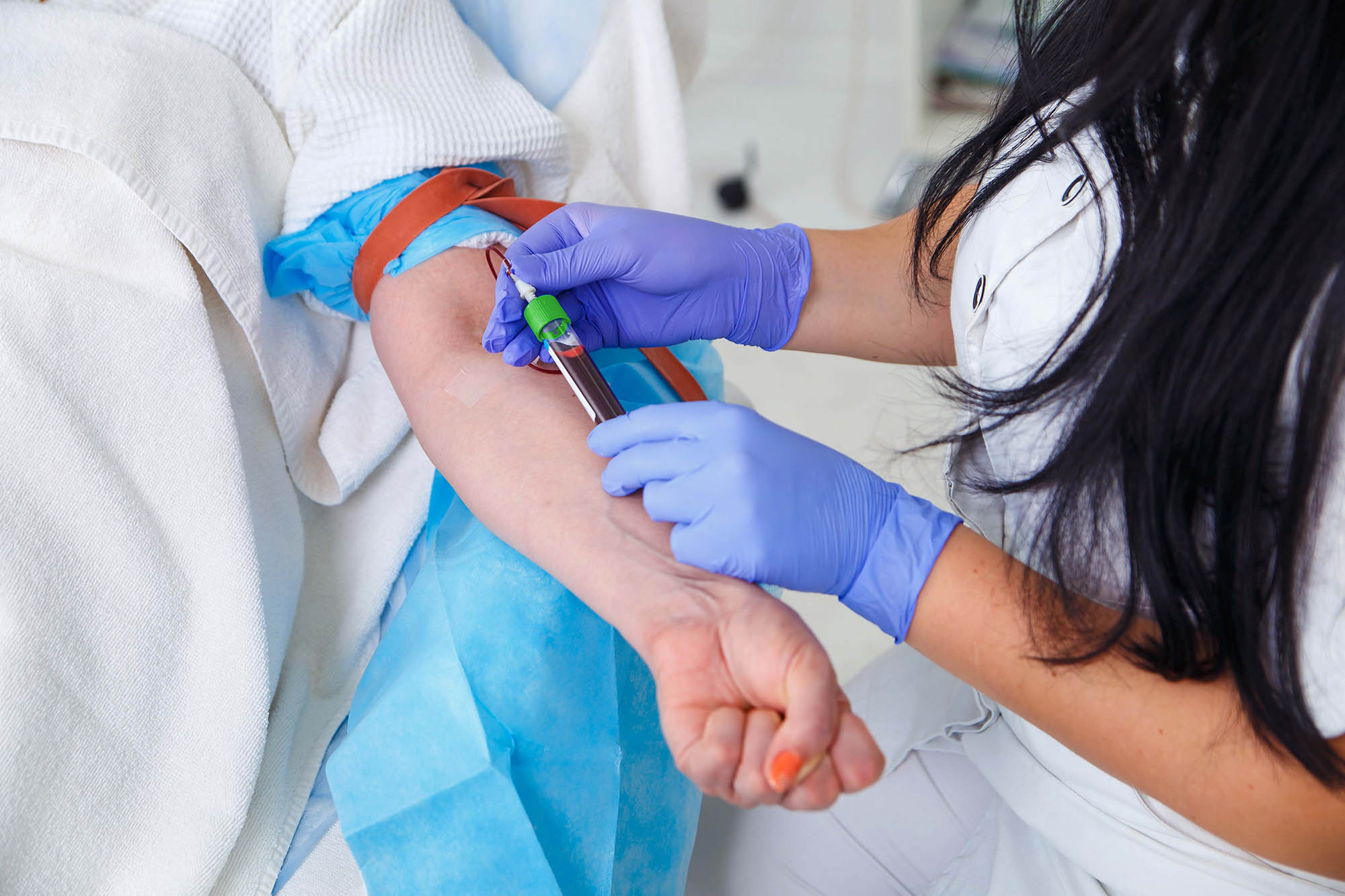 student drawing blood